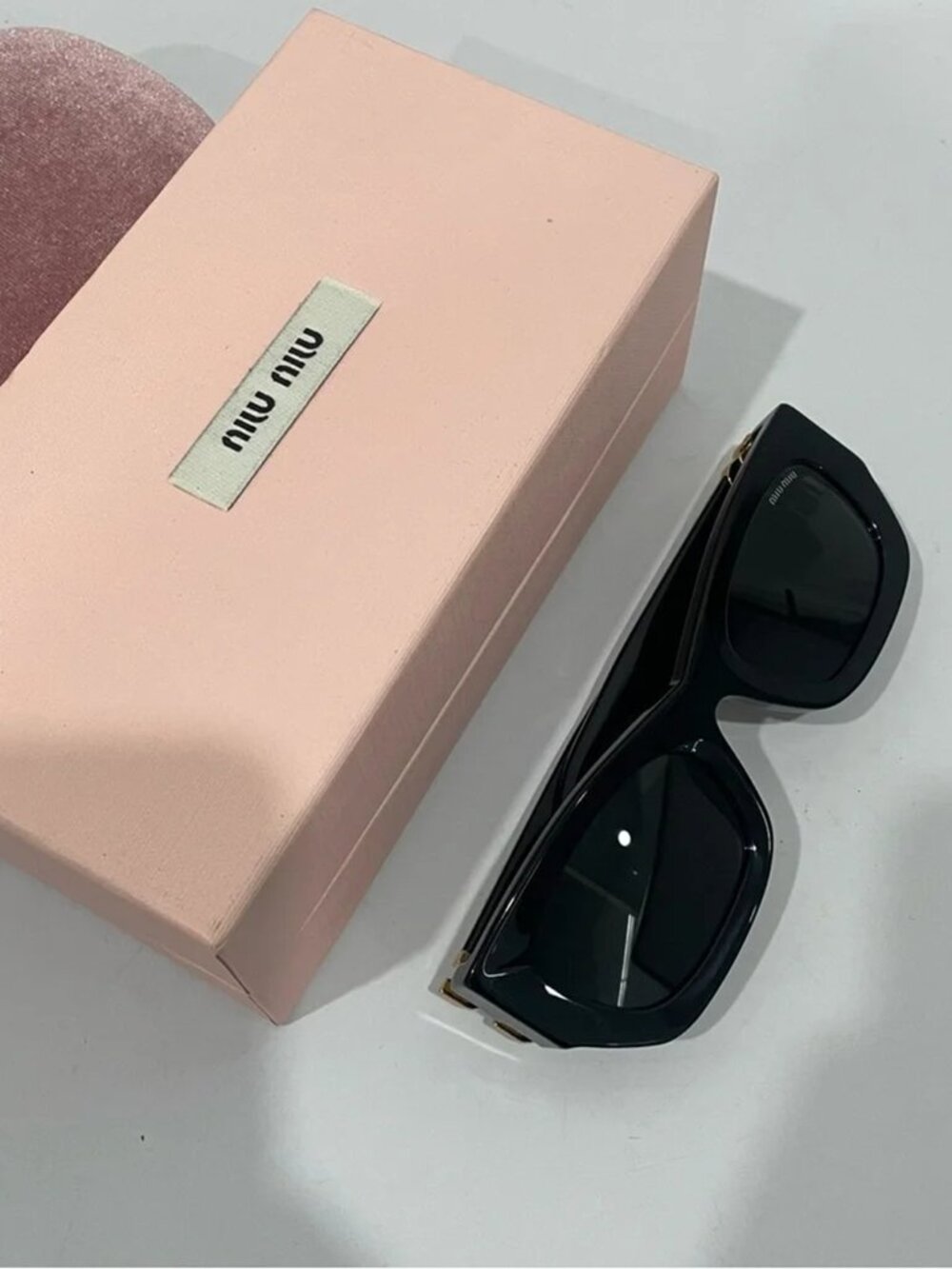 Miu Miu Black Sunglasses with Gold Detail - Picture 2 of 5
